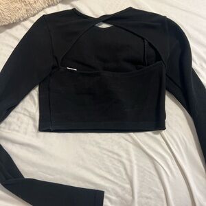 Thick black long sleeve crop top. with open back